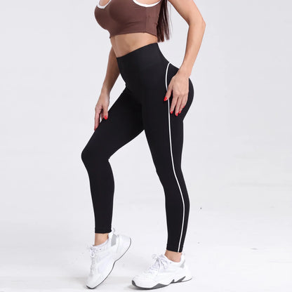 Sculvea essential seamless leggings - black - worn by model, side view