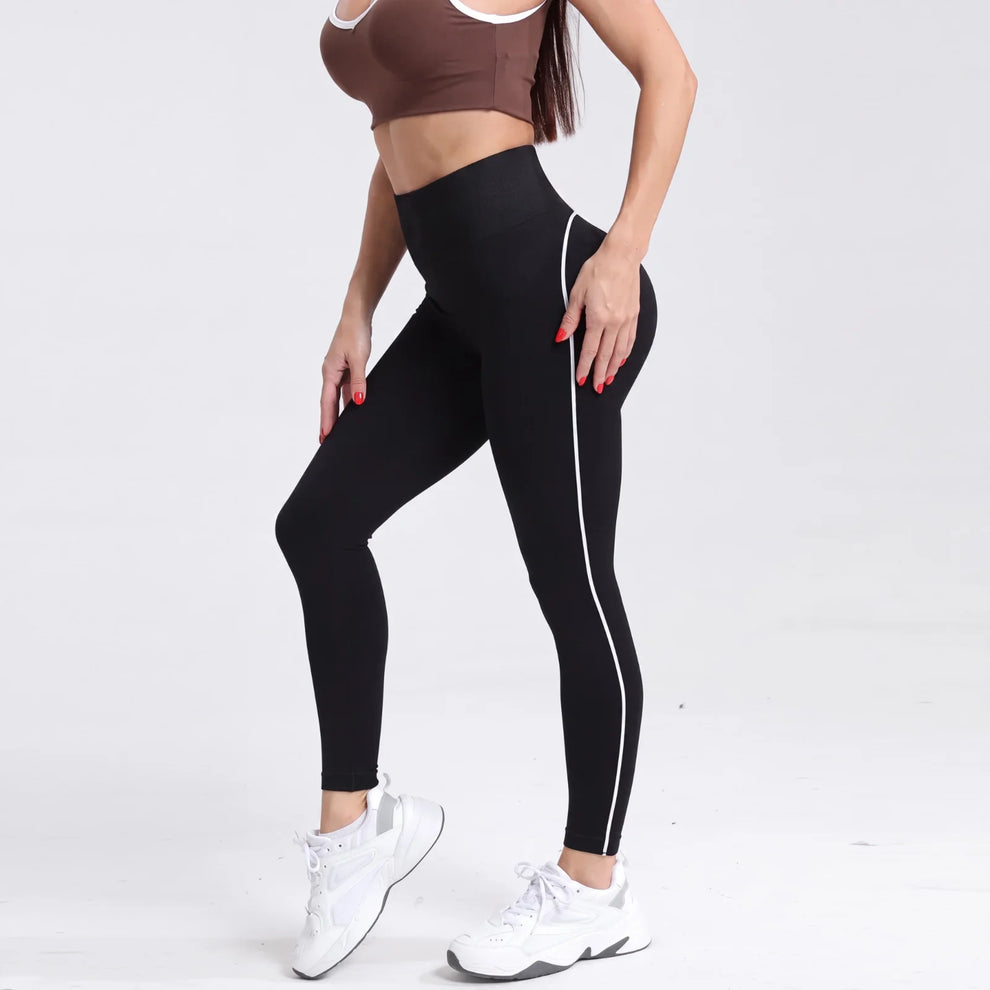 Sculvea essential seamless leggings - black - worn by model, side view