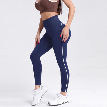 Sculvea essential seamless leggings - navy blue - worn by model, side view