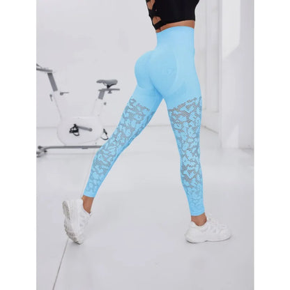 Sculvea seamless mesh leggings - sky blue - side view, in motion