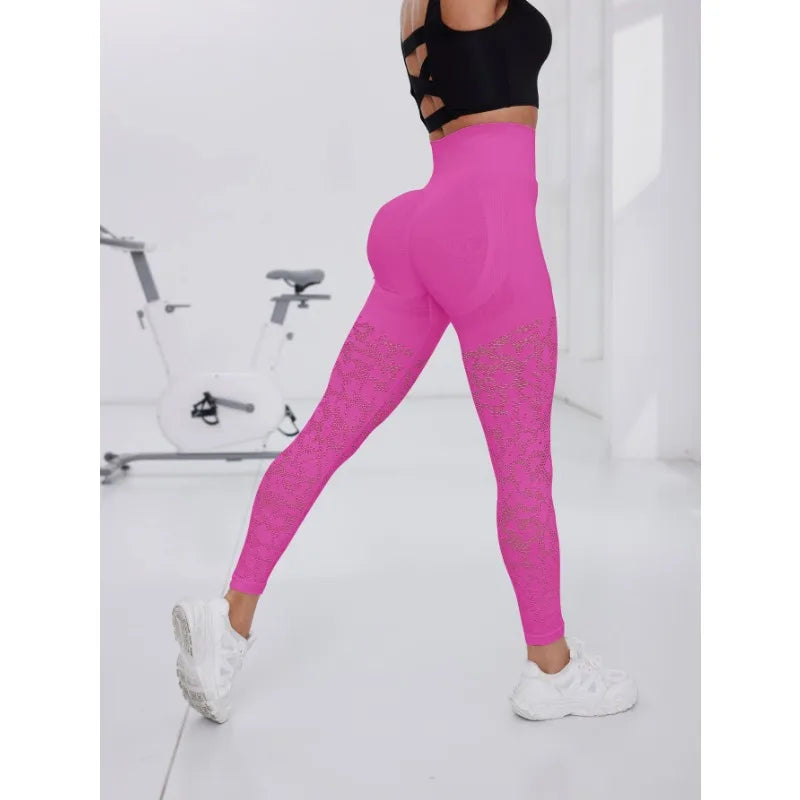 Sculvea seamless mesh leggings - fuchsia pink - side view, in motion