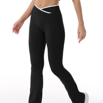 Sculvea push-up flare leggings - black - crossover waistband detail, walking