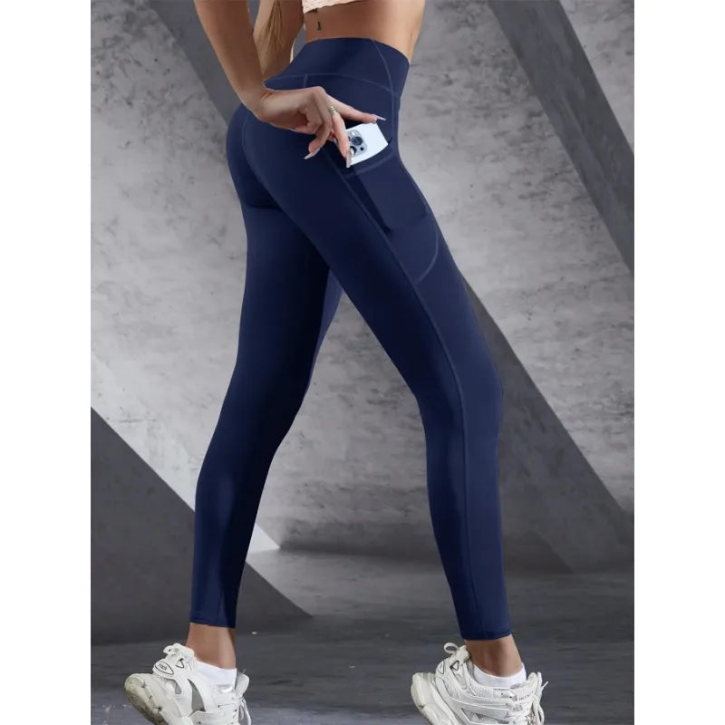 Sculvea high-waisted solid leggings with pockets - navy blue - pocket holding phone detail